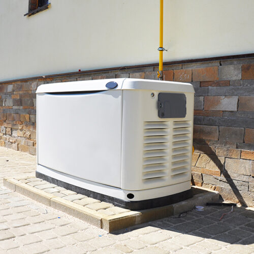 a standby generator installed outside of a family home